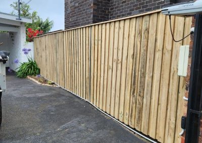 lapped and capped timber fence Dee Why