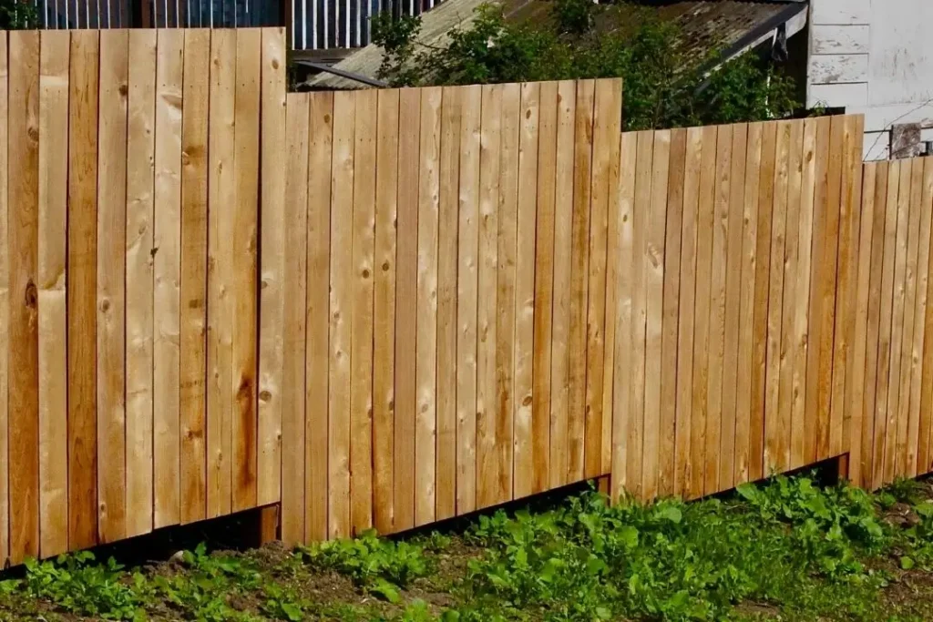 stepped fence on a sloped yard